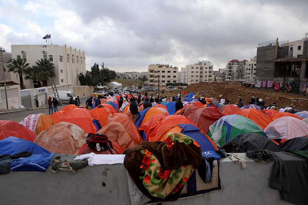 Sudanese refugees set up camp near the UNHCR building in Amman this week to demand 'better treatment' (Photo by Raad Adayleh)